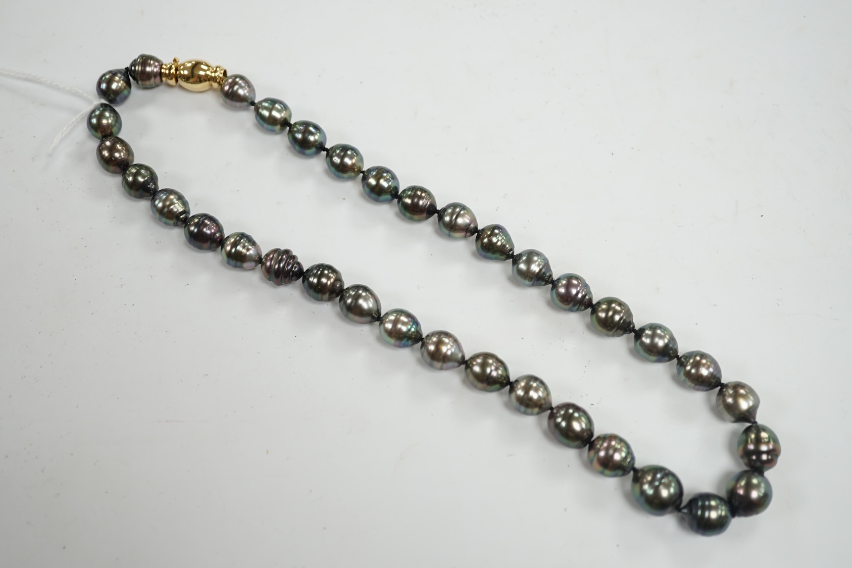 A modern single strand Tahitian cultured baroque pearl necklace with 750 clasp, 44cm. Condition - fair to good